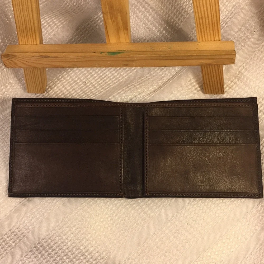 NWOT leather/tapestry wallet excellent condition